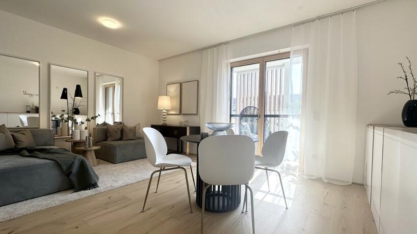 Wohnung Top 17 modern möblierter Wohn- und Essbereich