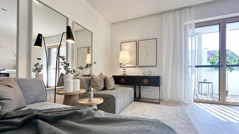 Wohnung Top 17 modern möblierter Wohnbereich mit Fensterfront